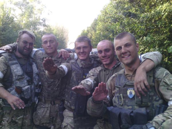 Group of Azov soldiers demonstrating Nazi salutes