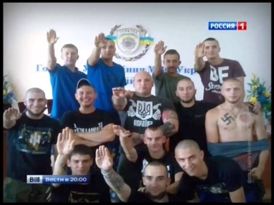 Group of Ukrainian Nazi posing with Nazi salutes