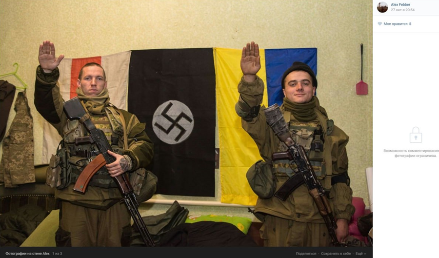 Two Ukrainian soldiers in front of a Ukrainian flag, a Belorussian nationalist flag and a Swastika banner