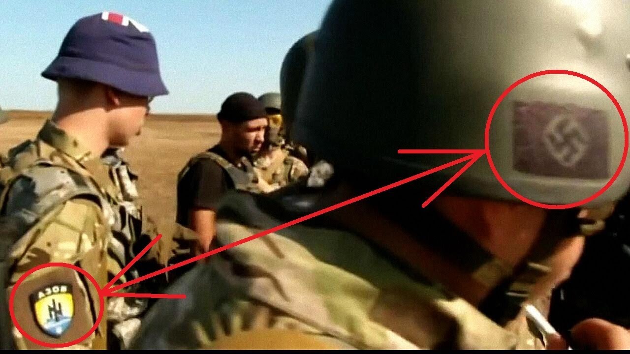 Another Ukrainian soldier with swastika on his helmet