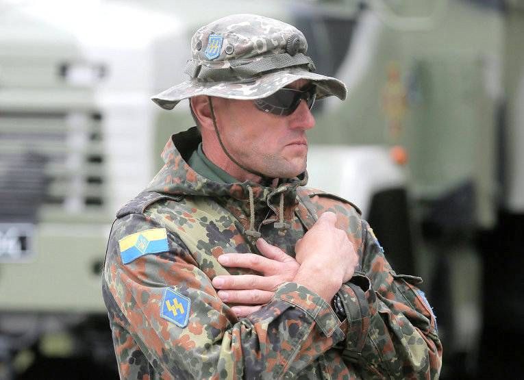 Another Ukrainian offices with SS symbols in Ukrainian colours on the uniform
