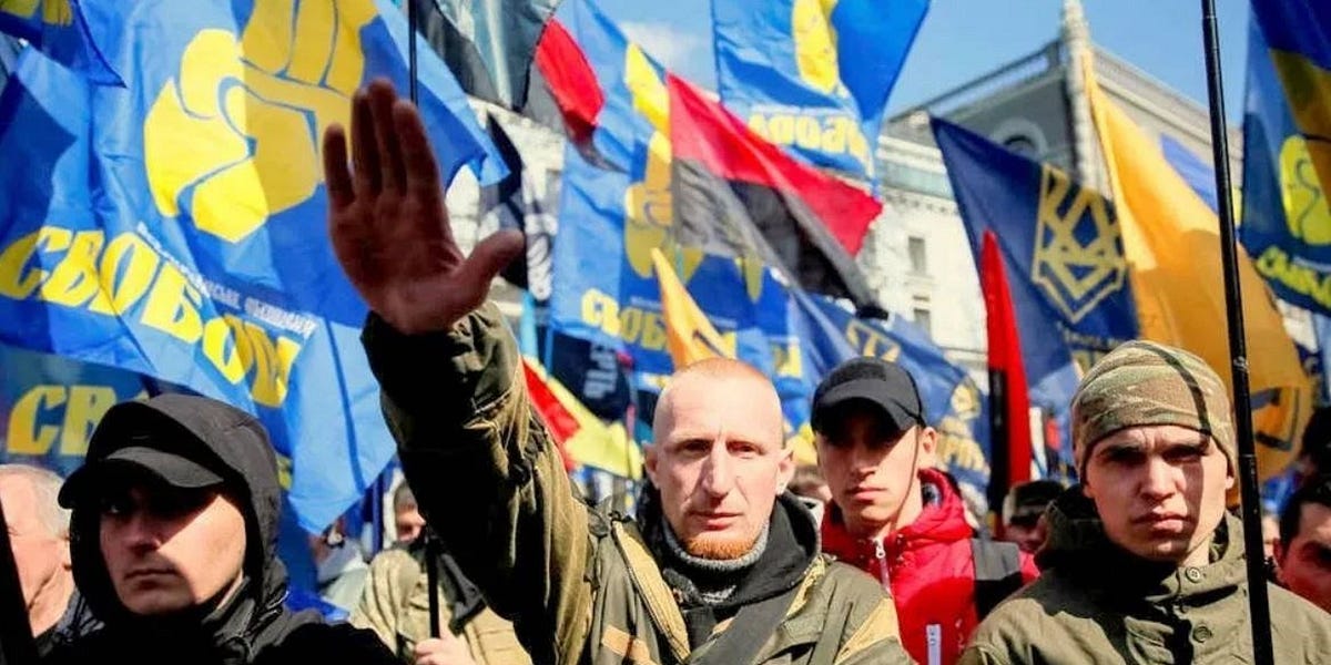Ukrainian neo-Nazi posing with a Nazi salute in the centre of Kiev