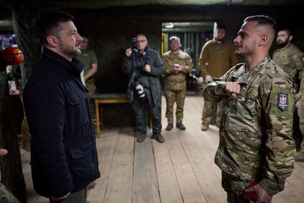 Zelenskyy decorates a soldier form an Ukrainian "SS" unit.